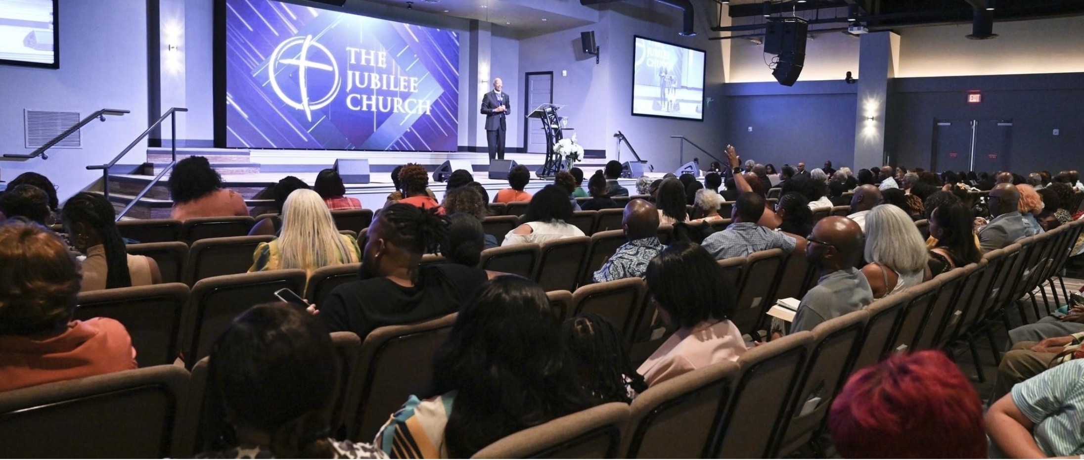 The Jubilee Church auditorium filled with attendees during a worship gathering