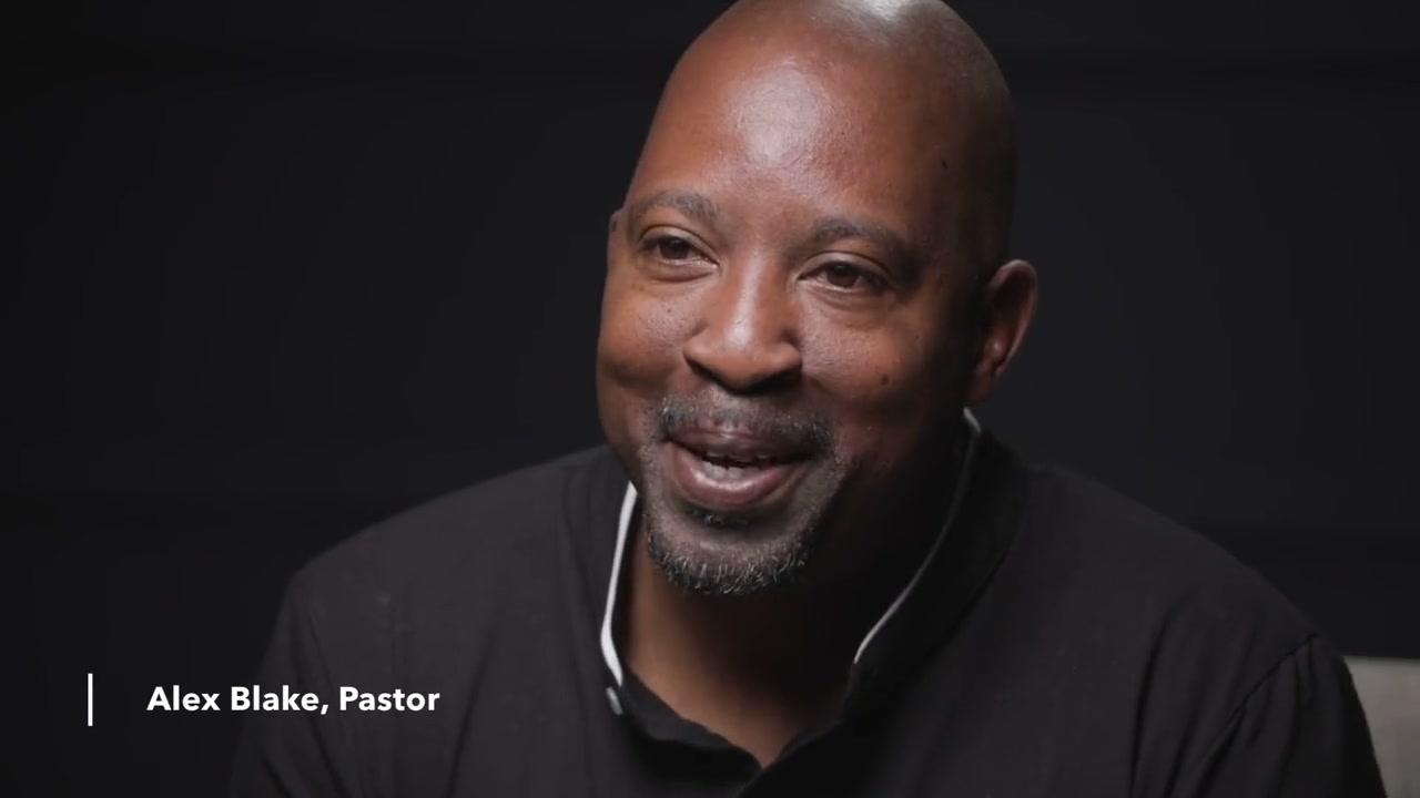 Alex Blake, pastor, speaking about faith in action
